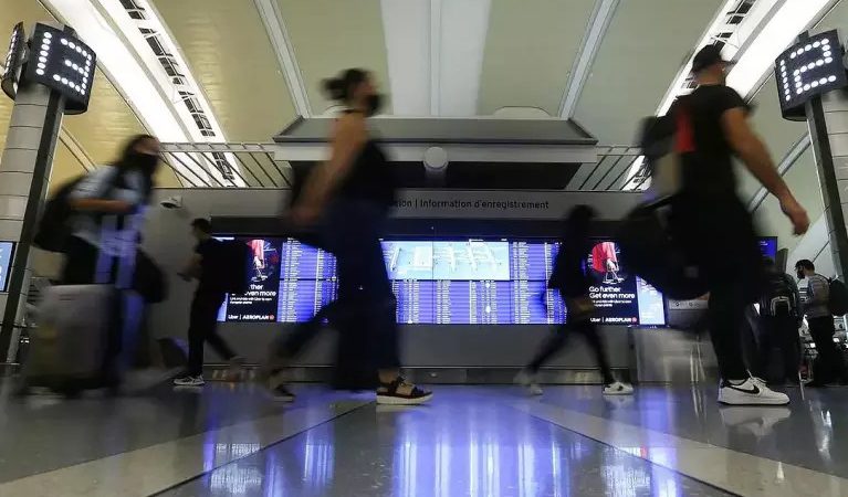 加國機票價格開始降 究竟會下降多少?